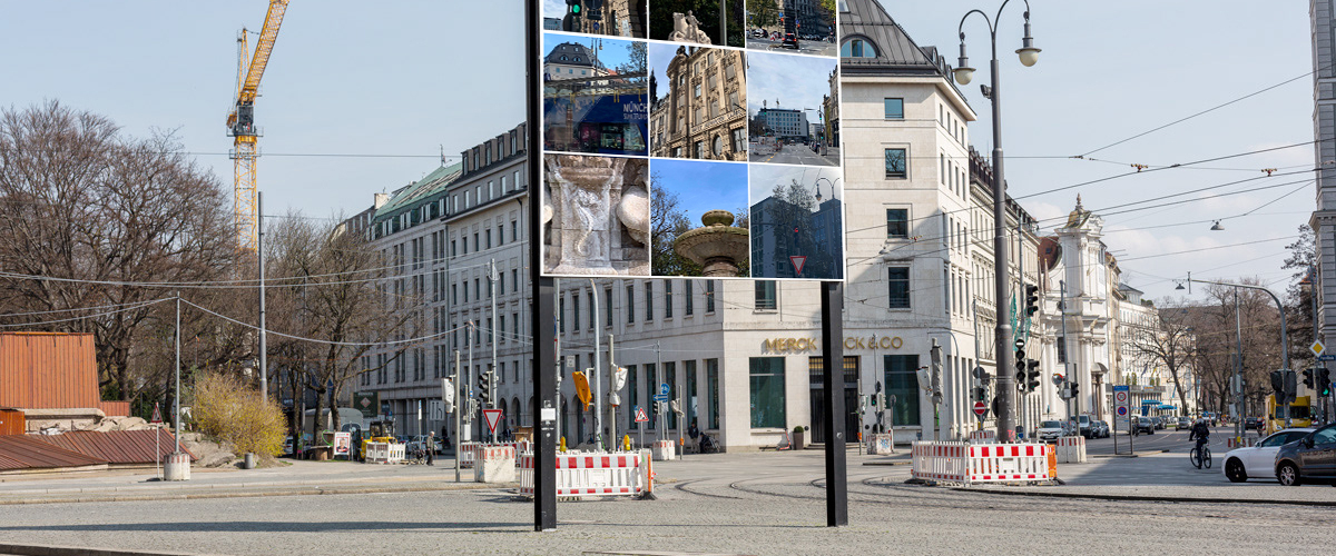 diagonal view of the billboard with the captcha motif by Milen Till. It shows, as usual with a captcha, nine square image tiles with motif cutouts from the surroundings of the billboard