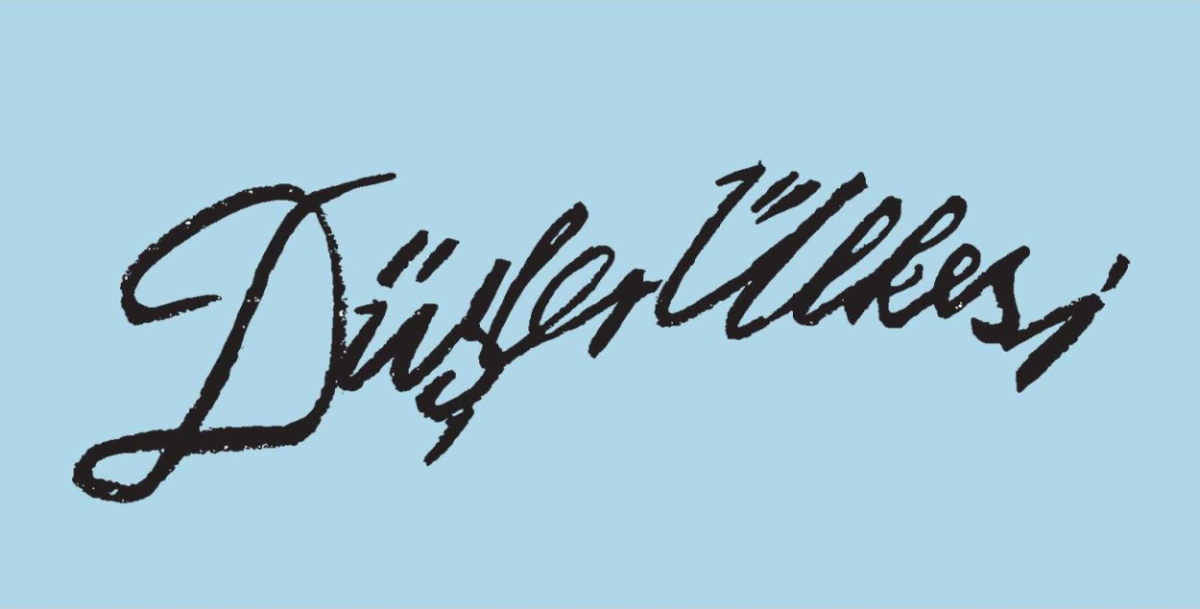 In black handwriting on a blue background appear the words "Düşler Ülkesi", which can be translated literally from Turkish as "Land of Dreams".