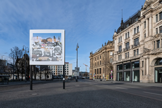 Frontal view of the billboard. Above a colorful collage of image, word and sign appears barely legible the phrase "Whose Utopia we shall return to".