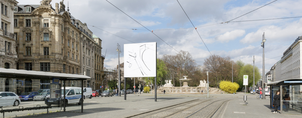 View of Lenbachplatz facing out of the city. The billboard in the centre shows an ink drawing in black and white with geometric and curved shapes and lines.