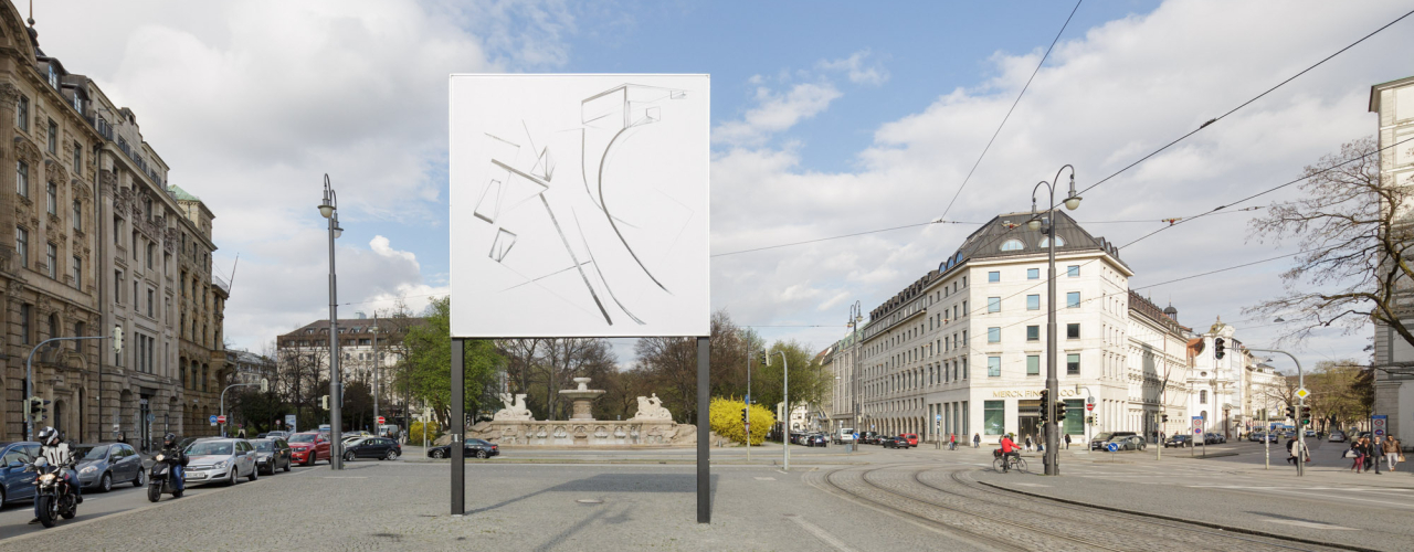 View of Lenbachplatz facing out of the city. The billboard in the centre shows an ink drawing in black and white with geometric and curved shapes and lines.
