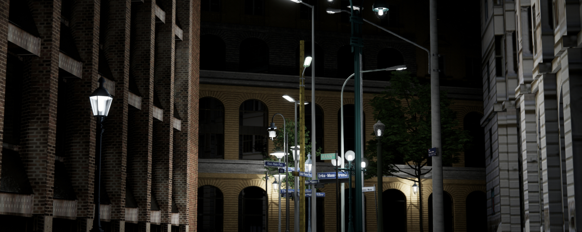 Various illuminated street lamps stand in the middle of large buildings. There are blue street signs on the lanterns